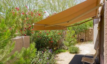 Shade with Style: Transforming Your Patio with a Retractable House Awning